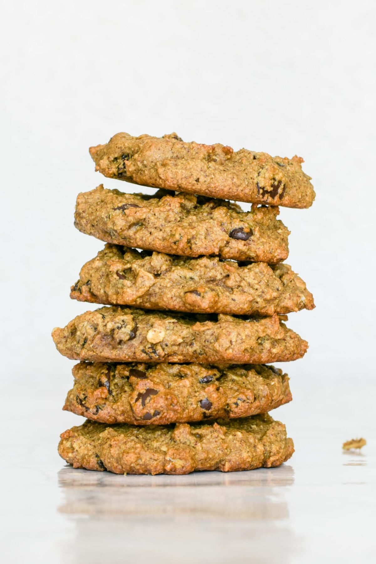 A stack of 6 oatmeal raisin cookies.