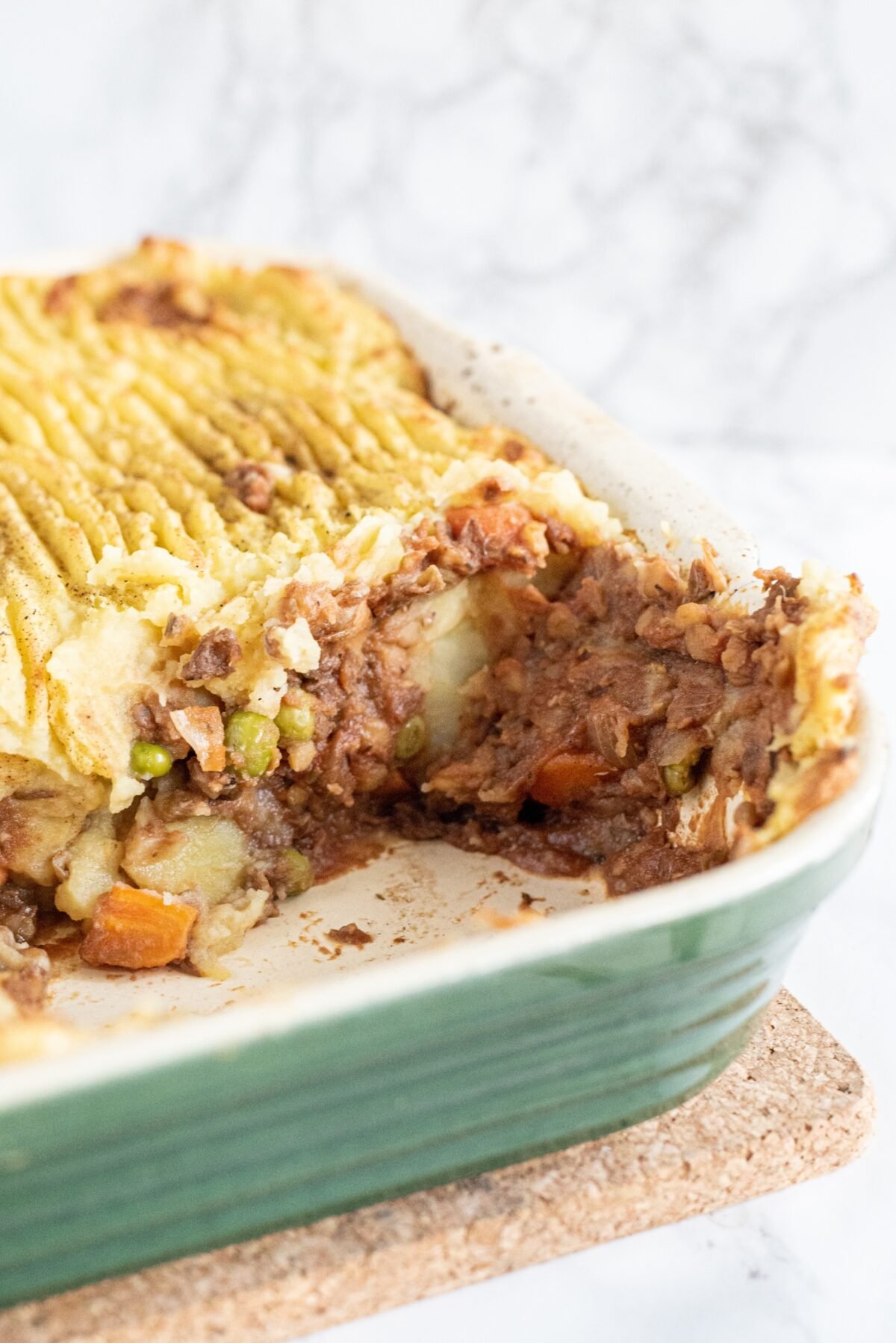 A casserole dish filled with shepherd's pie.