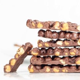 A stack of Chocolate Chickpea Bark on the counter.