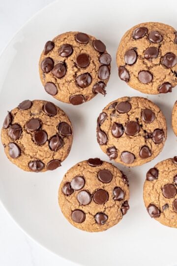A plate of chocolate chip muffins.