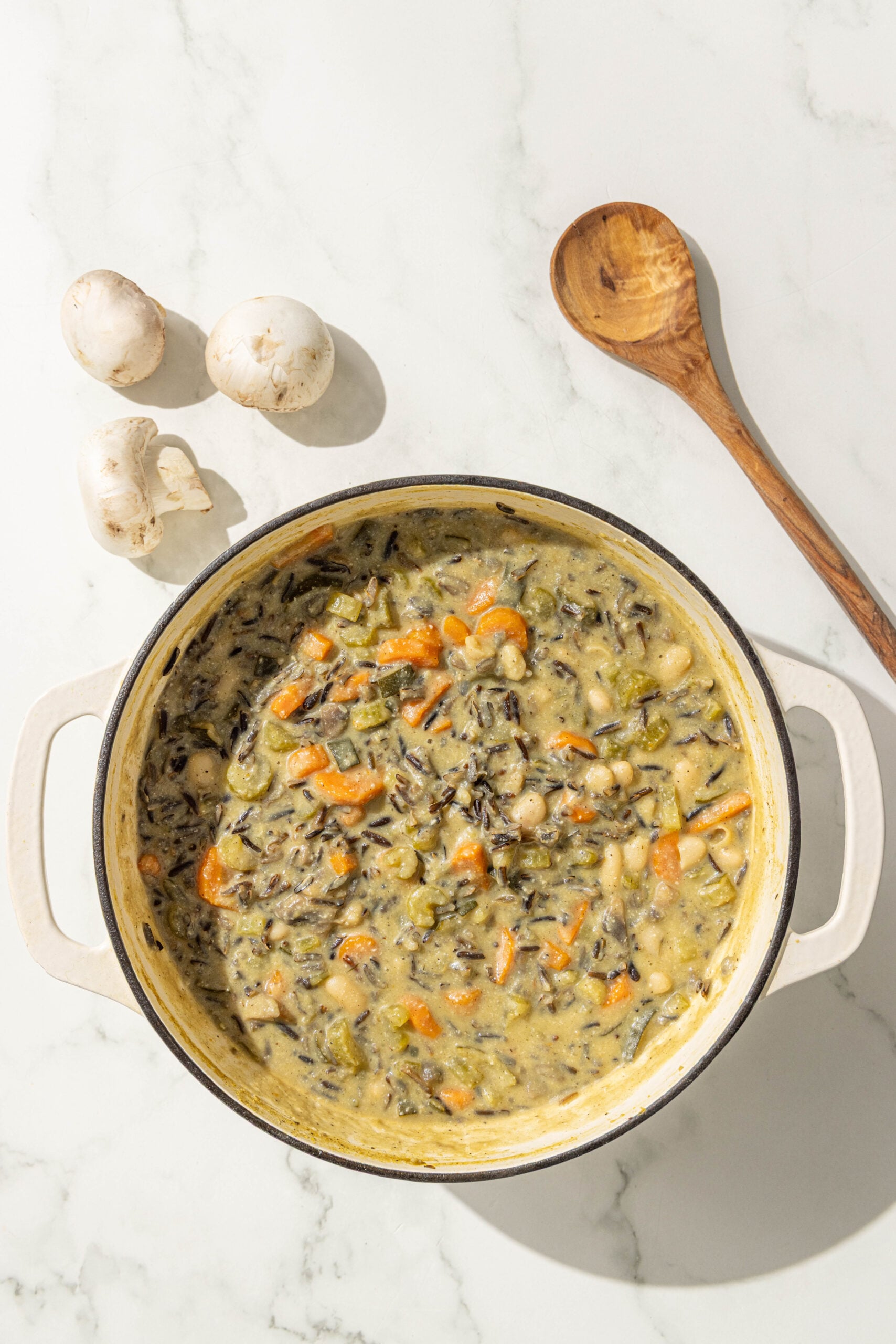 A large pot of creamy vegan wild rice soup.