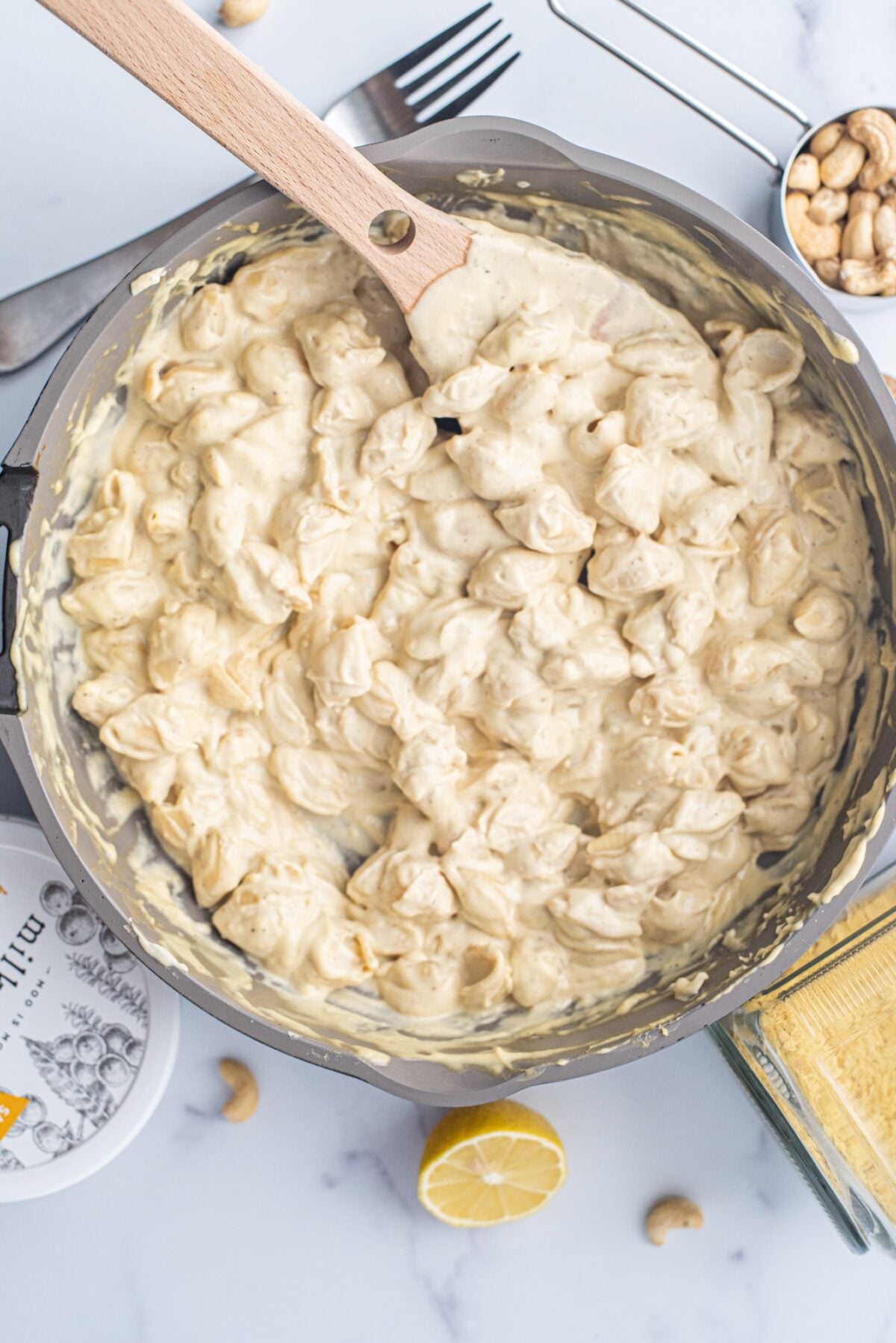 A pan filled with white cheddar mac and cheese.