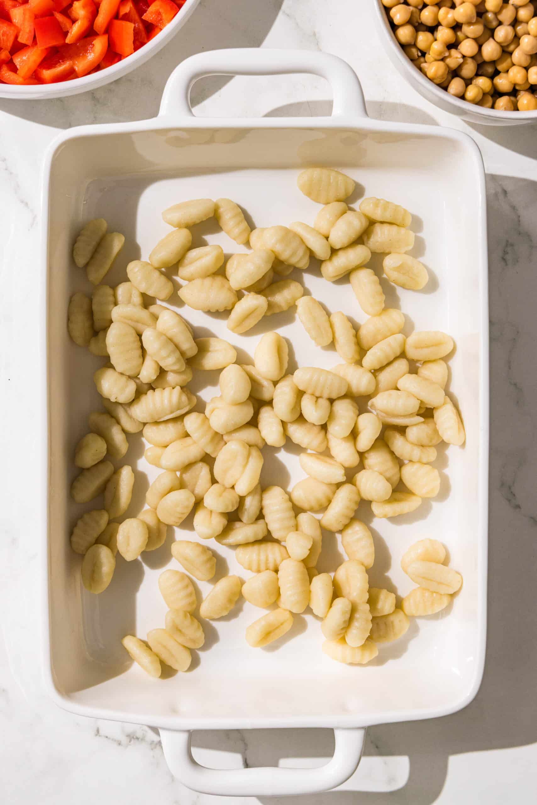A casserole dish filled with gnocchi.